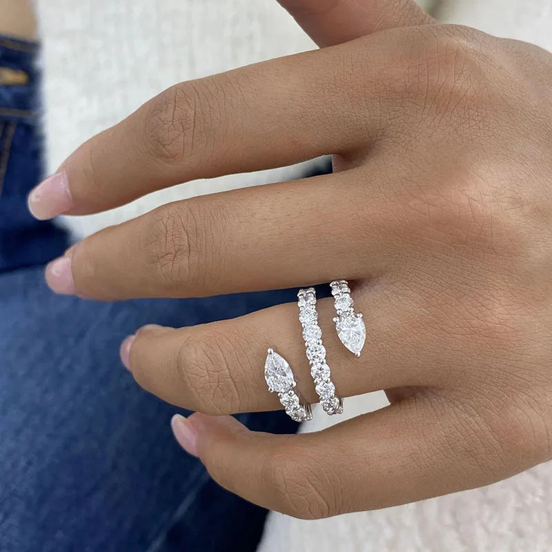 Gold wrap ring with pear-cut and round lab-grown diamonds