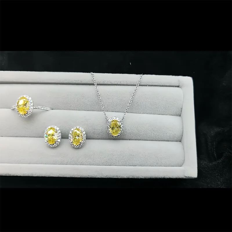 Yellow oval lab-grown diamond ring necklace and earrings