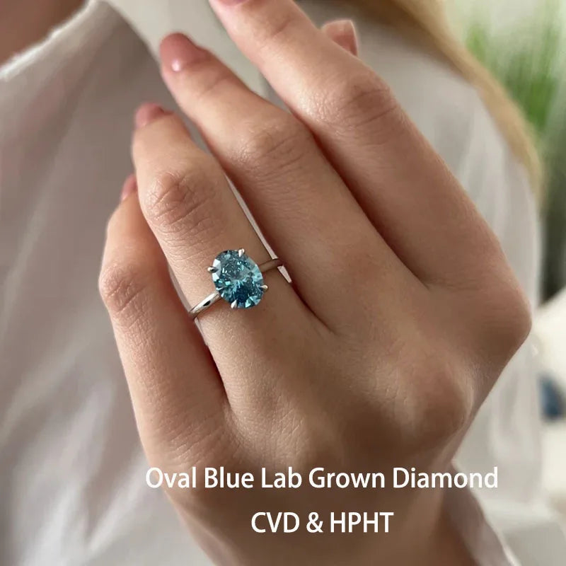 Blue oval-cut lab-grown diamond engagement ring
