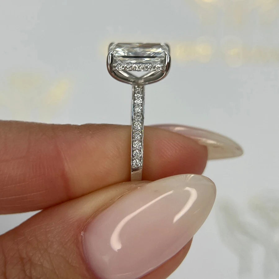Gold halo ring with radiant-cut lab-grown center diamond