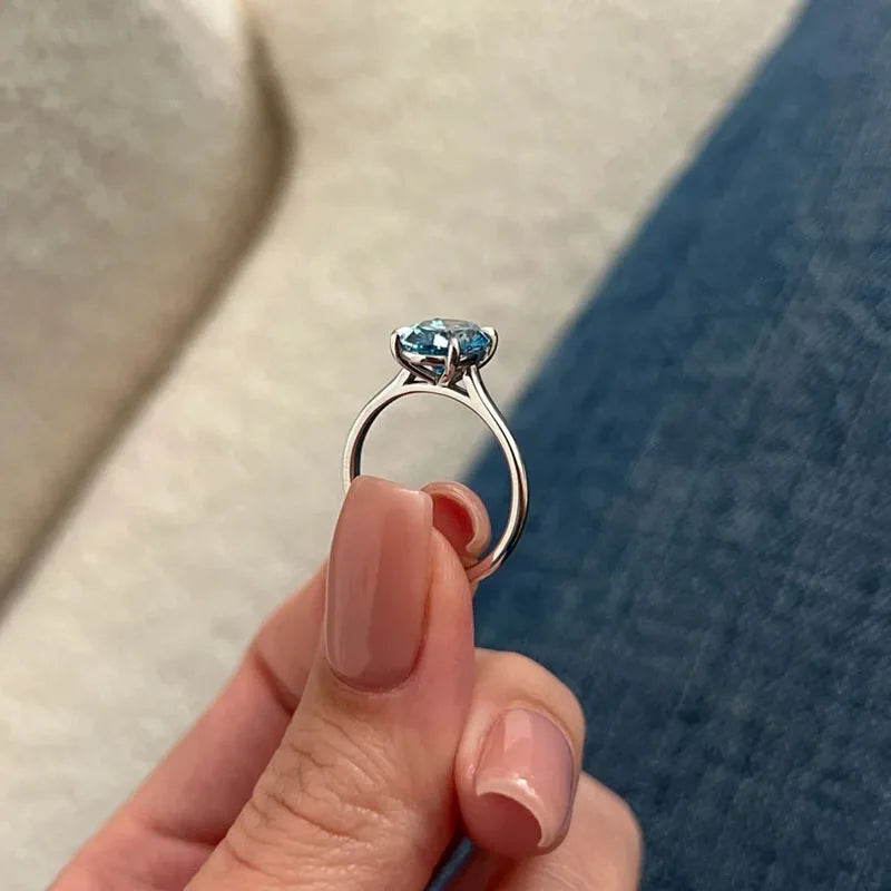 Two carat blue oval diamond ring