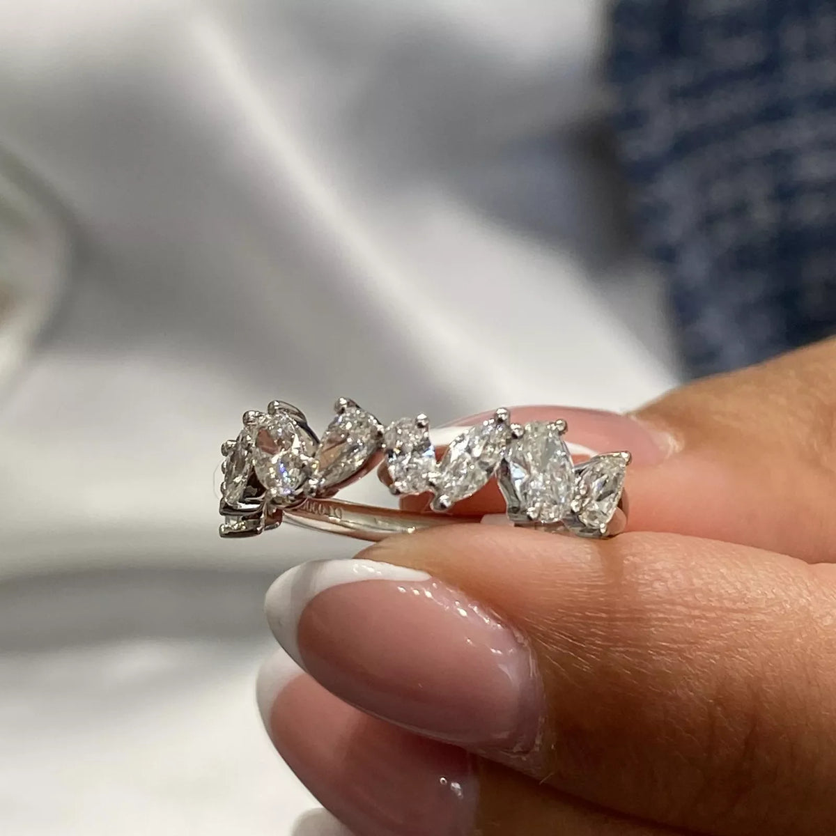 Diamond band with mixed gemstone cuts
