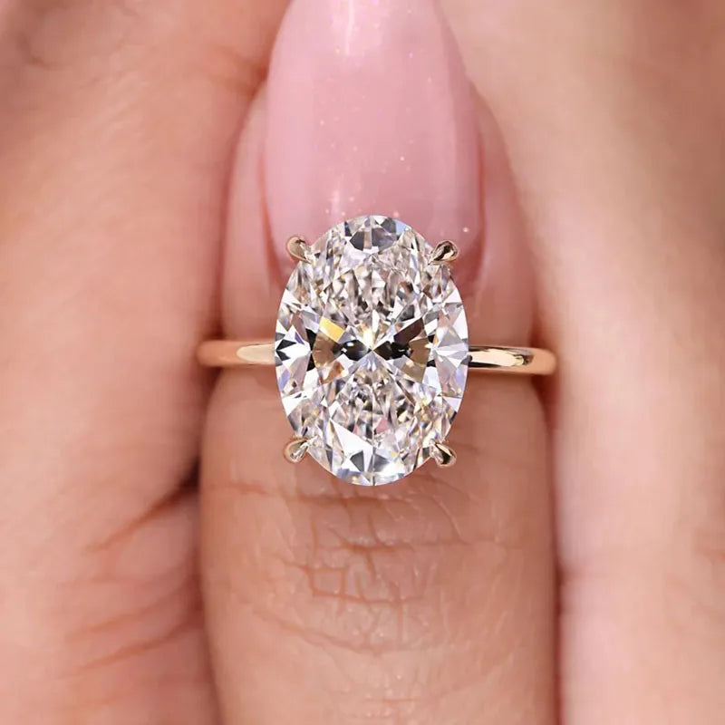 Prong-set oval diamond solitaire ring