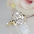 Oval lab-grown diamond halo engagement ring