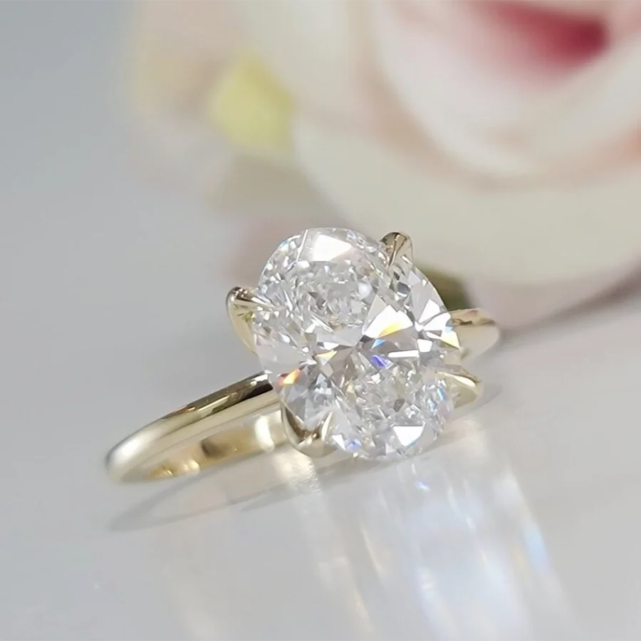 Oval lab-grown diamond halo engagement ring