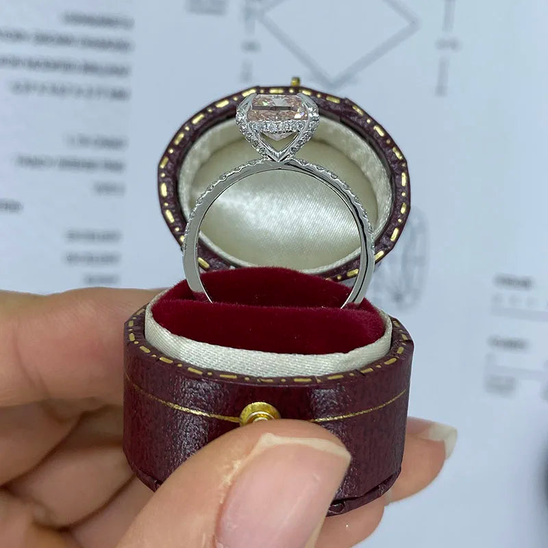 Gold engagement ring with pink cushion diamond