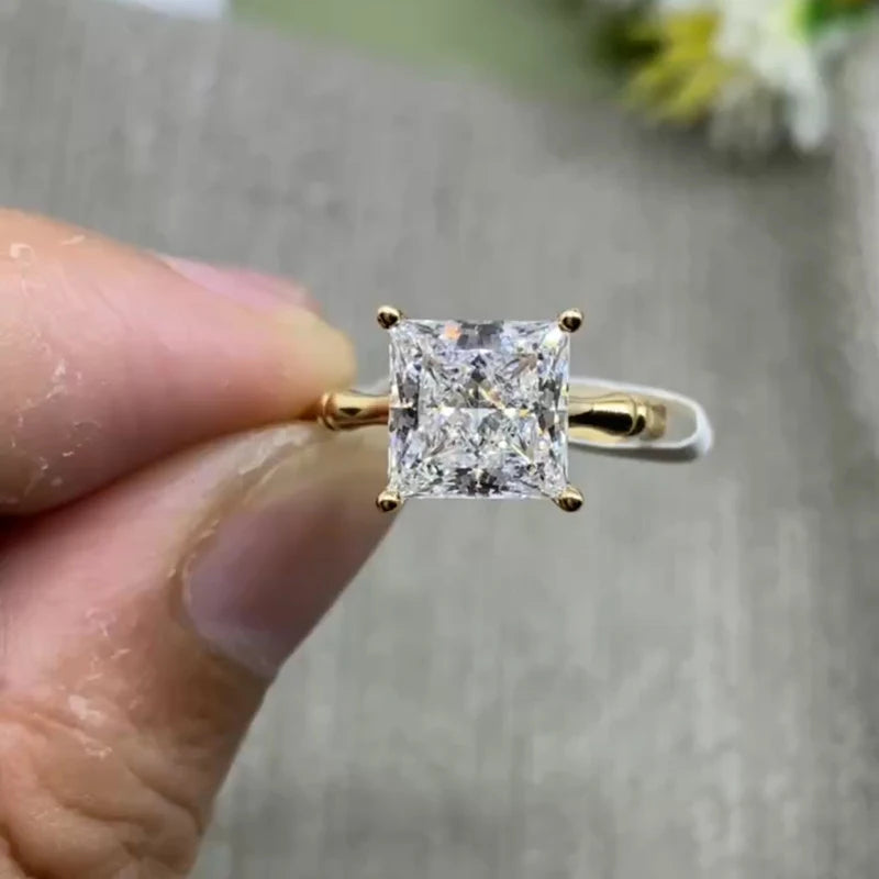 14K yellow gold solitaire ring with princess-cut diamond