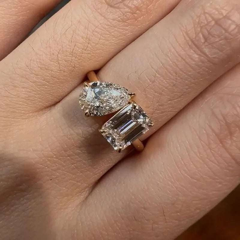 Emerald and pear lab-grown diamond two-stone ring