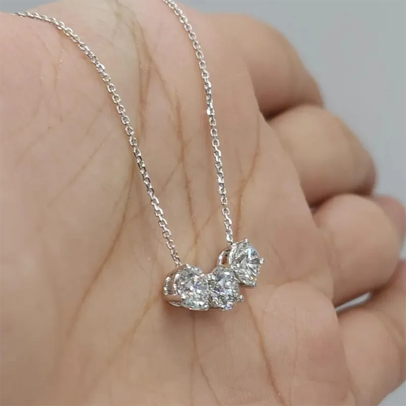 Round diamond three-stone pendant necklace