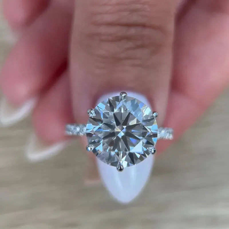 Gold six-prong round-cut diamond engagement ring