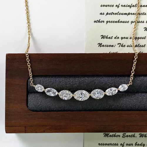 Curved necklace set with oval lab-grown diamonds