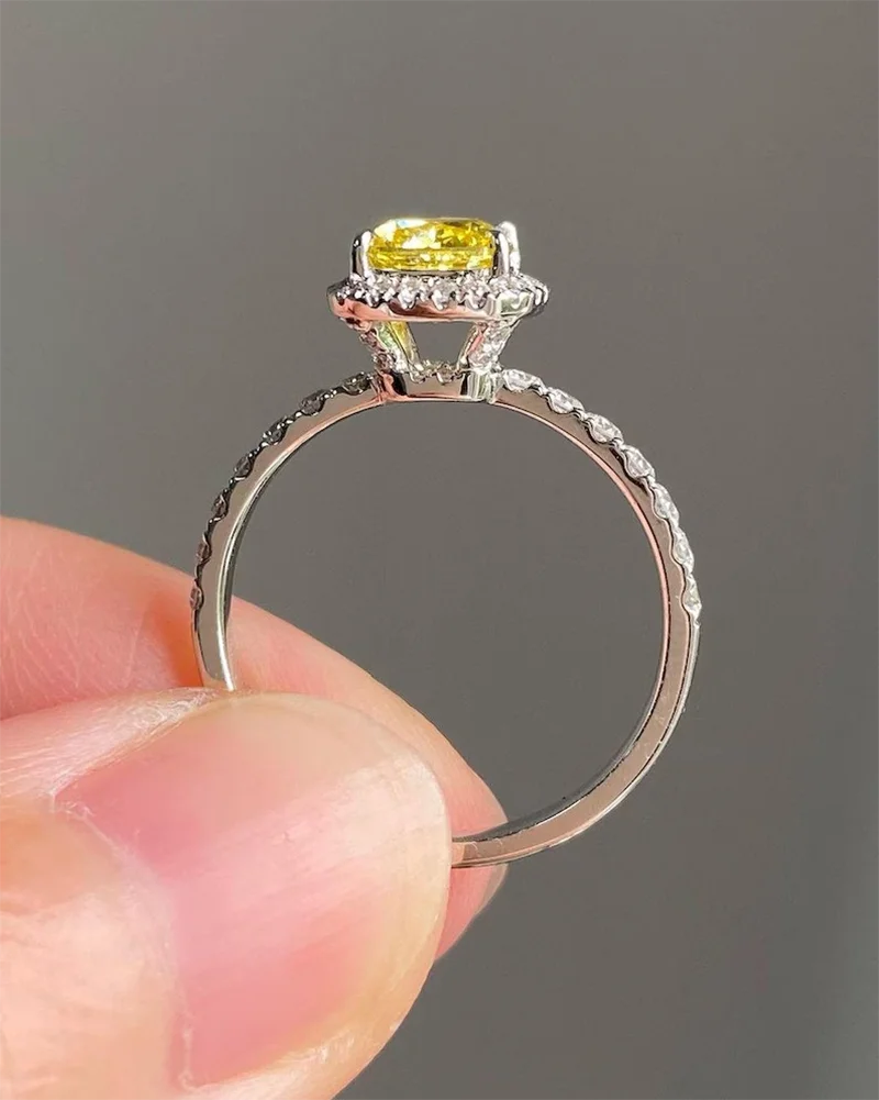 Gold yellow cushion diamond ring with halo