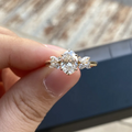 Oval-cut lab-grown diamond engagement ring with marquise diamond accents