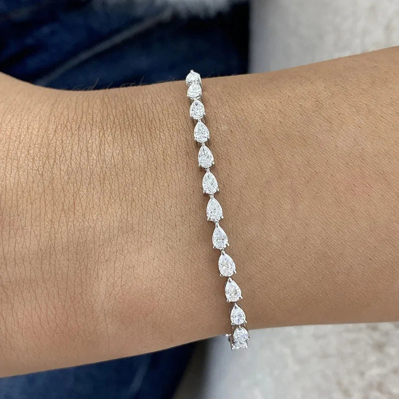 Thirteen pear diamond line bracelet