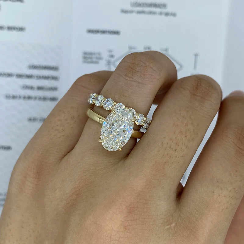 Oval-cut diamond ring paired with matching band