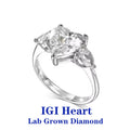 Heart-shaped lab-grown diamond ring with pear accents
