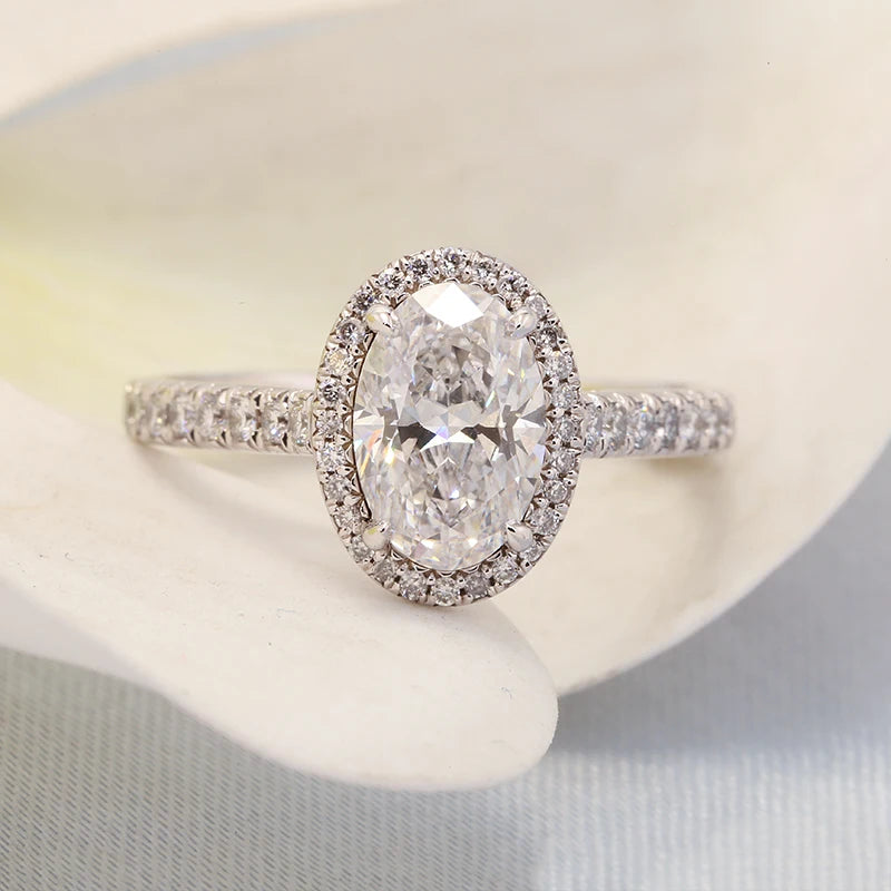 Lab-grown diamond engagement ring featuring oval-cut center stone