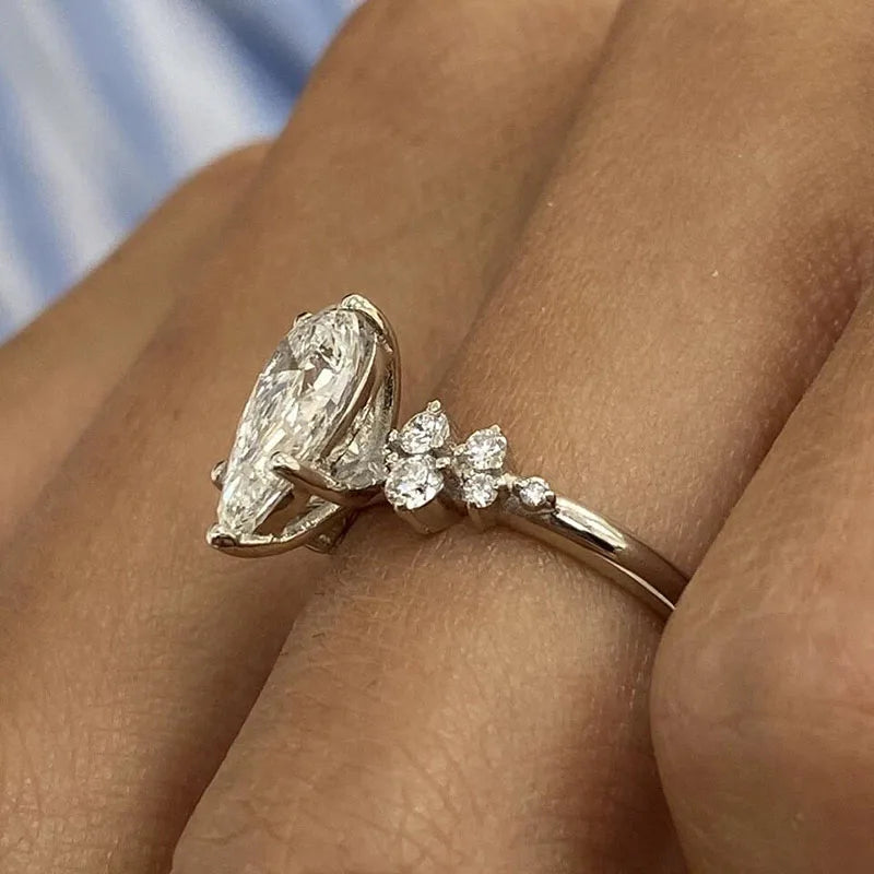 Lab-grown diamond pear-cut accent engagement ring