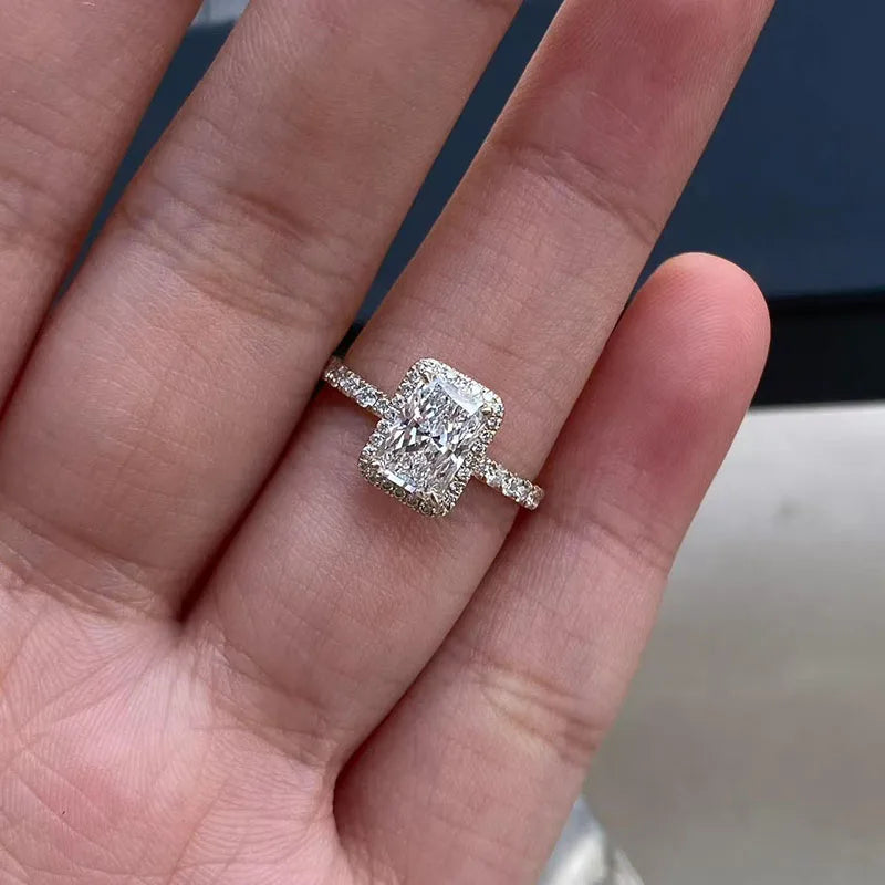 Lab-grown diamond accent ring with radiant-cut center stone