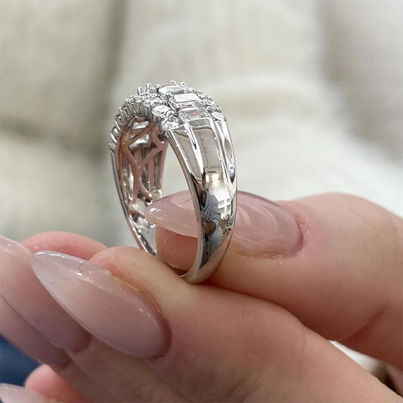 Emerald and round diamond band