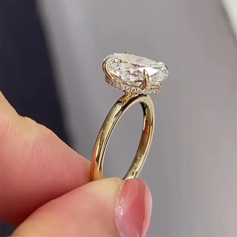 Lab-grown diamond ring with oval center and diamond accents