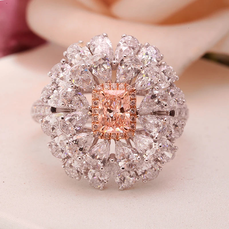 Pink radiant-cut diamond ring with diamond accents