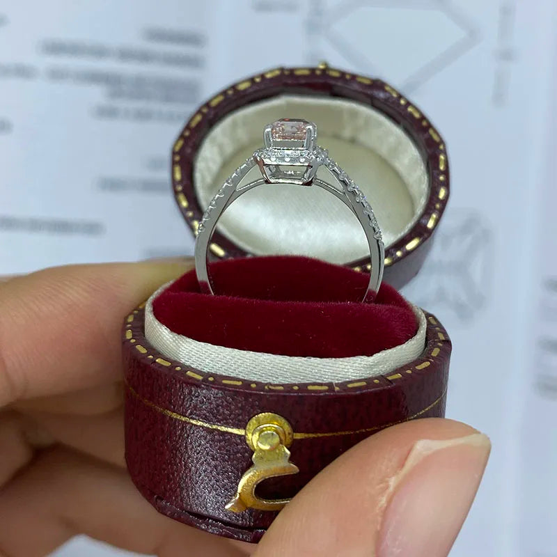 Gold ring featuring pink radiant diamond