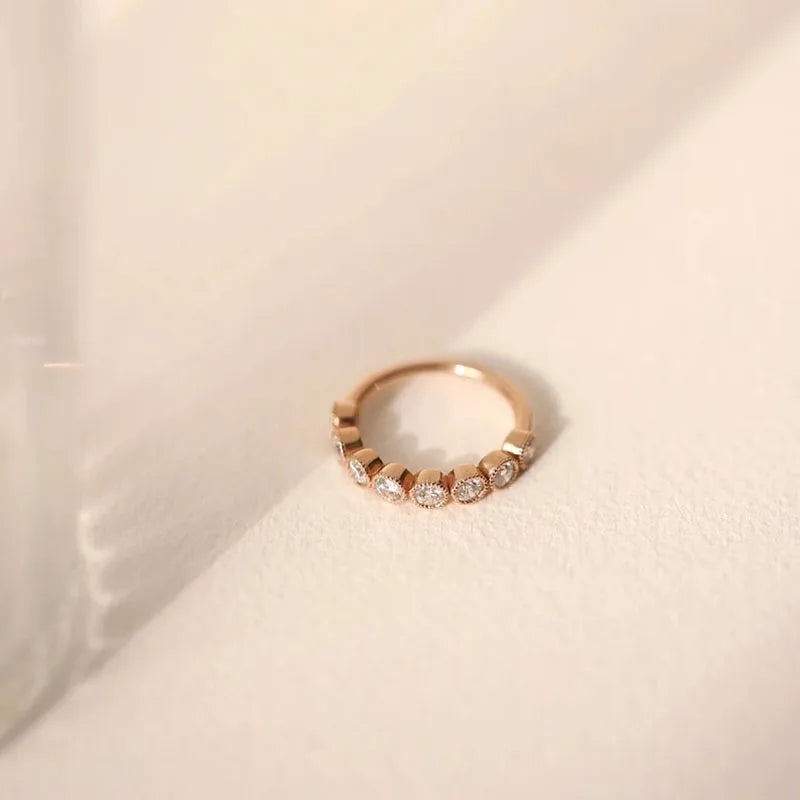 Gold ring set with round lab-grown diamonds