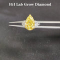 Yellow pear lab-grown diamond three-stone ring