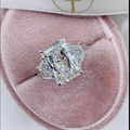 Five carat radiant-cut lab-grown diamond ring with accents