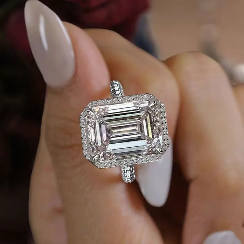 Large emerald-cut lab-grown diamond ring with accent diamonds