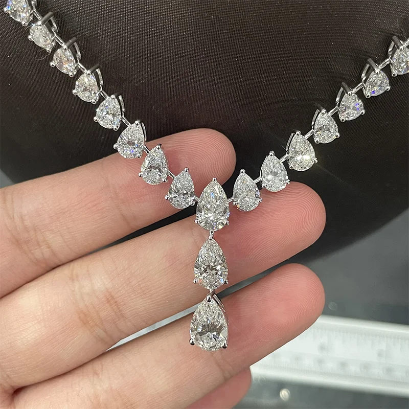 Pear diamond necklace with elongated gemstones