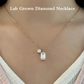Emerald and round lab-grown diamond pendant necklace