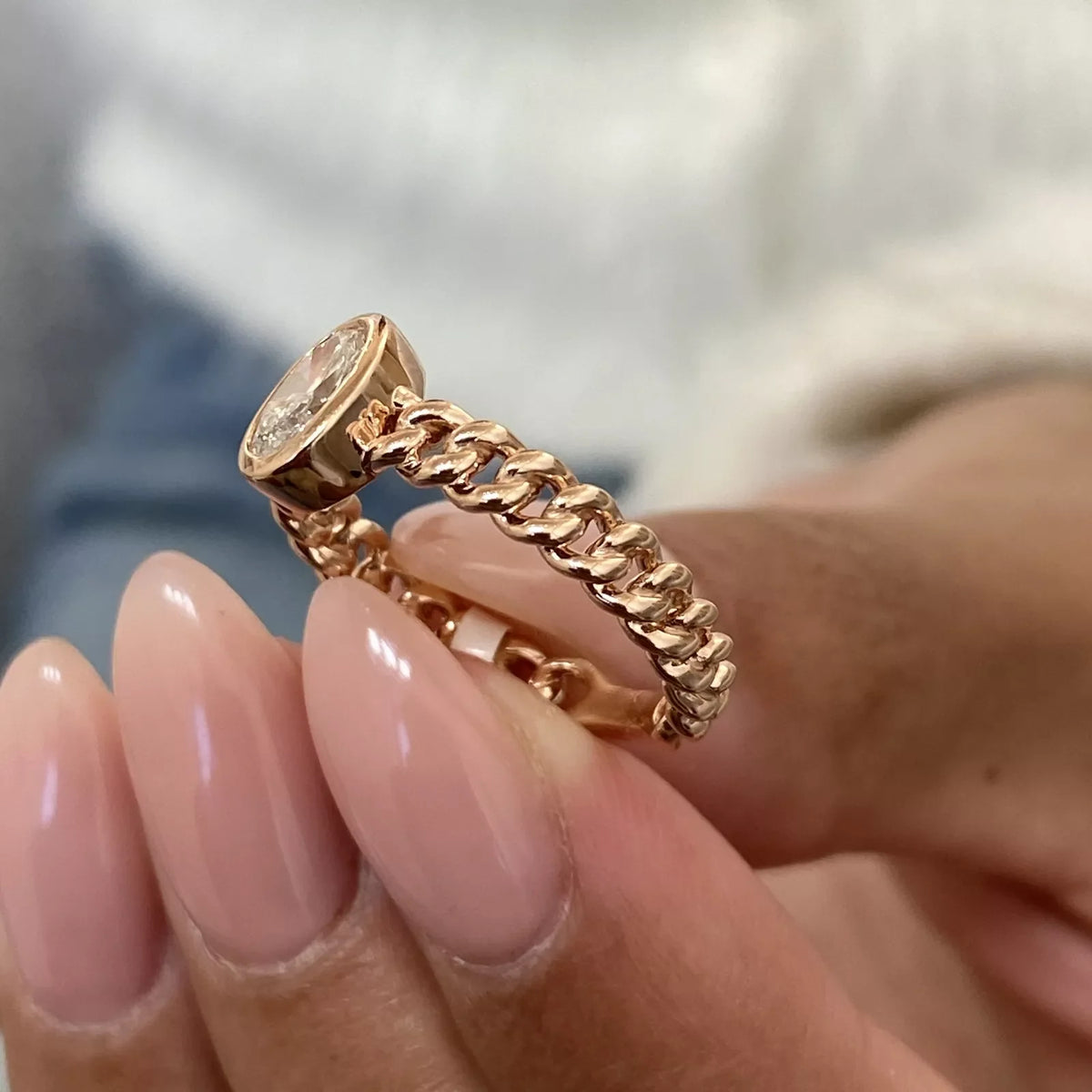 Oval diamond ring in a minimalist setting