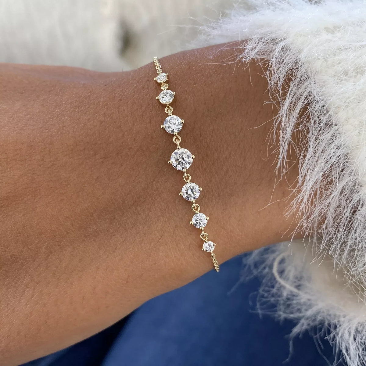 Gold station bracelet set with spaced round lab-grown diamonds