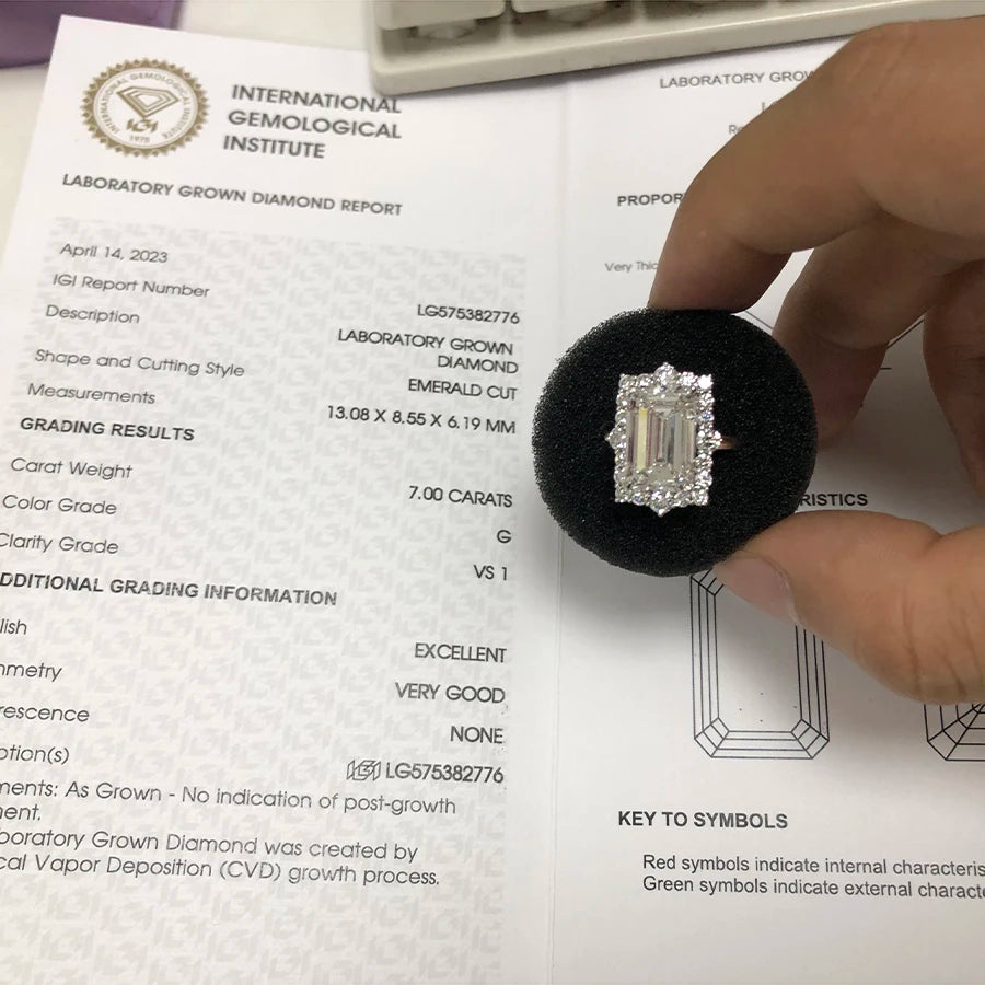 Emerald-cut lab-grown diamond engagement ring with pavé band