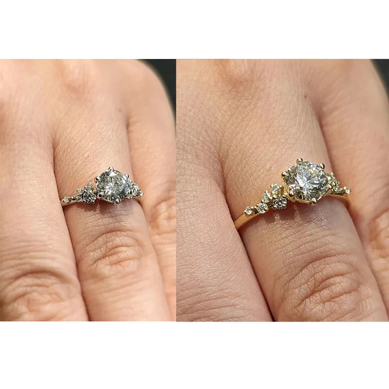 Round diamond ring with delicate cluster accents