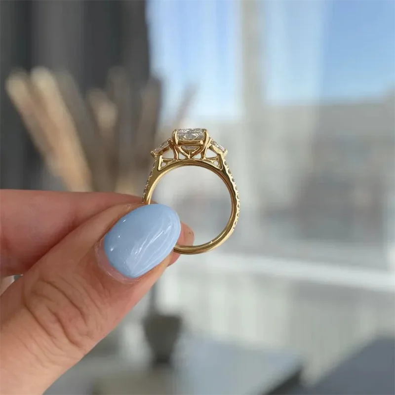 Radiant-cut lab-grown diamond ring in three-stone setting