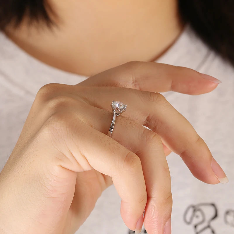Prong-set round diamond engagement ring
