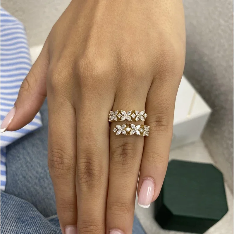 Gold wrap ring with round and marquise diamonds