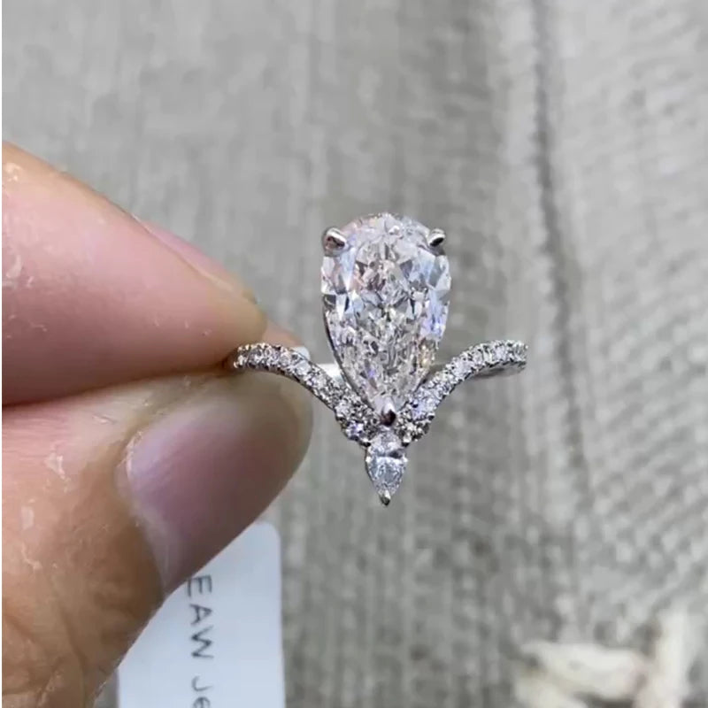 Gold V-shaped ring with pear lab-grown diamond