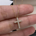 Round lab-grown diamond cross pendant