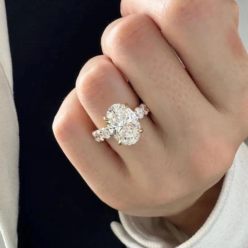Five carat oval lab-grown diamond ring with diamond accents