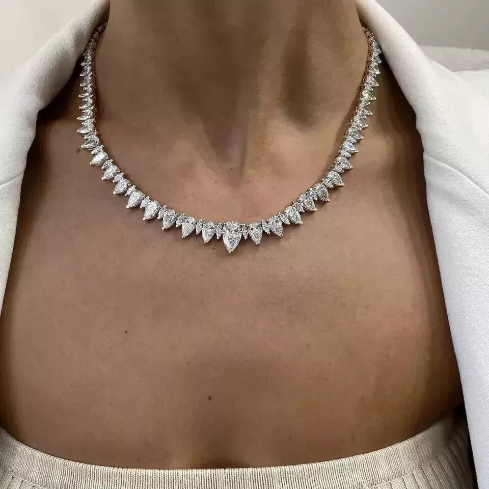 Tennis necklace with pear and marquise-cut diamonds