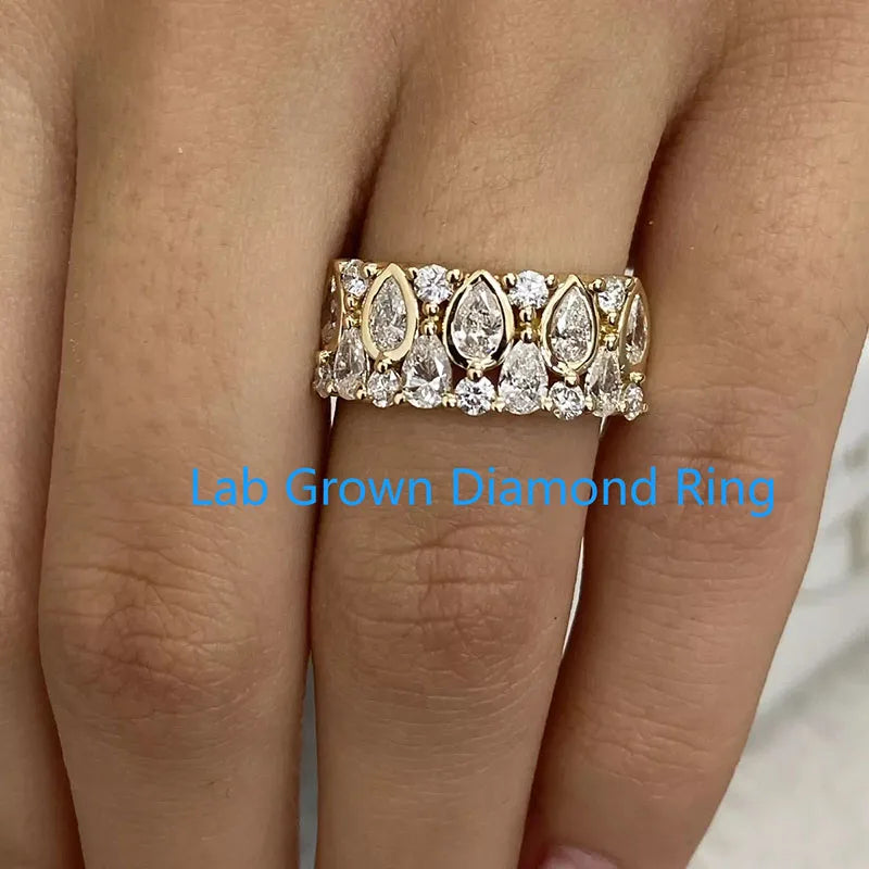 Cluster ring with pear-cut and round diamonds