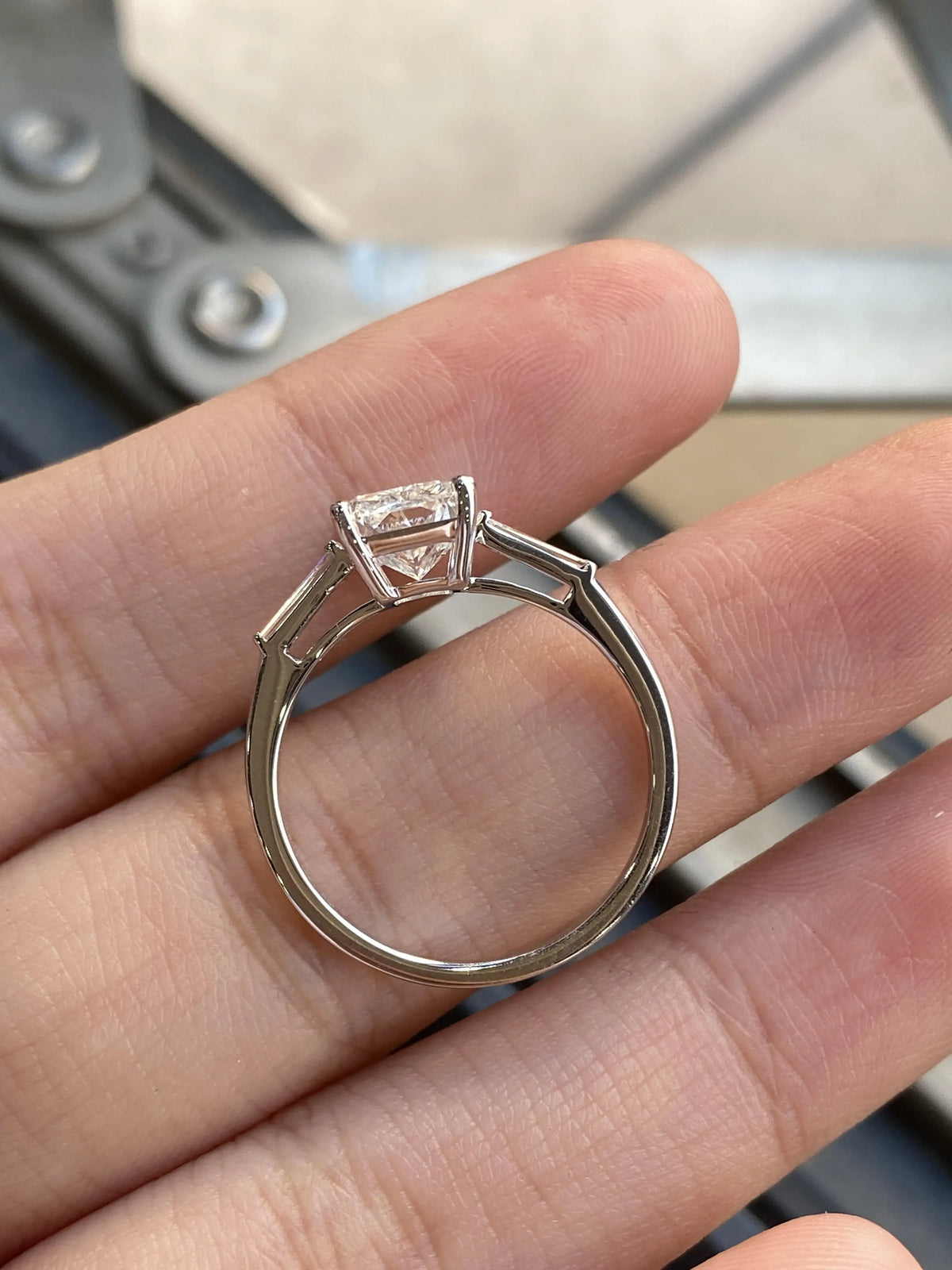 Radiant-cut diamond ring with pavé accents