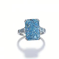 Blue radiant-cut lab-grown diamond engagement ring