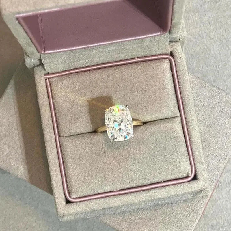 Gold ring with large cushion-cut diamond
