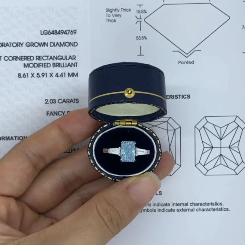 Gold ring with blue radiant-shaped lab-grown diamond