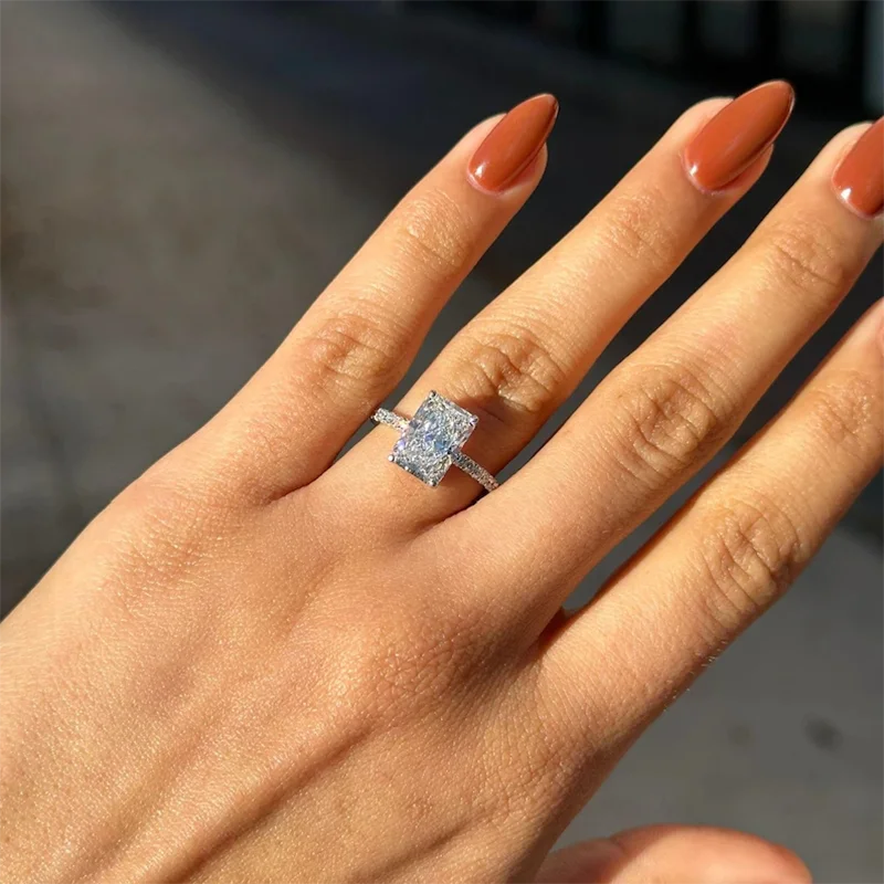 Sterling silver engagement ring with radiant diamond